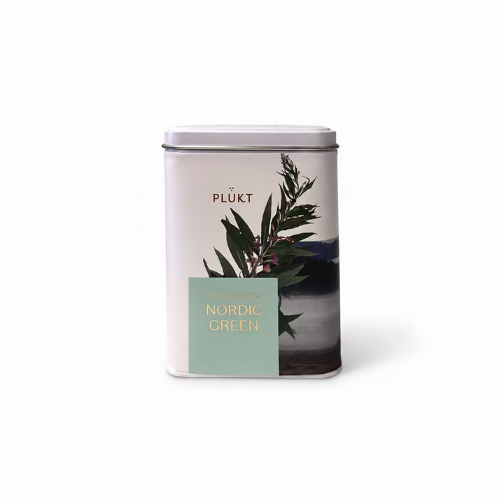 A cylindrical metal tea tin for Plükt &